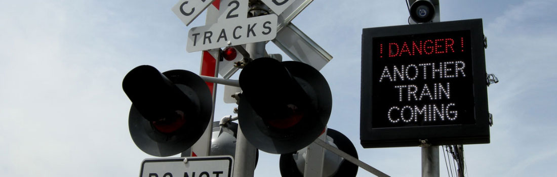 Railroad Crossing Warning Signs: Keeping Motorists & Pedestrians Safe Image