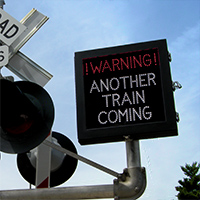 another train coming sign image