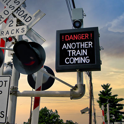 danger another train coming sign image