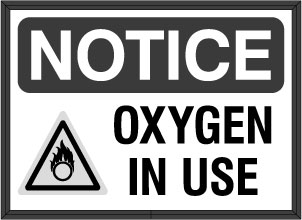 NOTICE OXYGEN IN USE w/ Oxygen hazard symbol Image